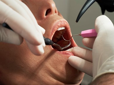 A person receiving dental care 